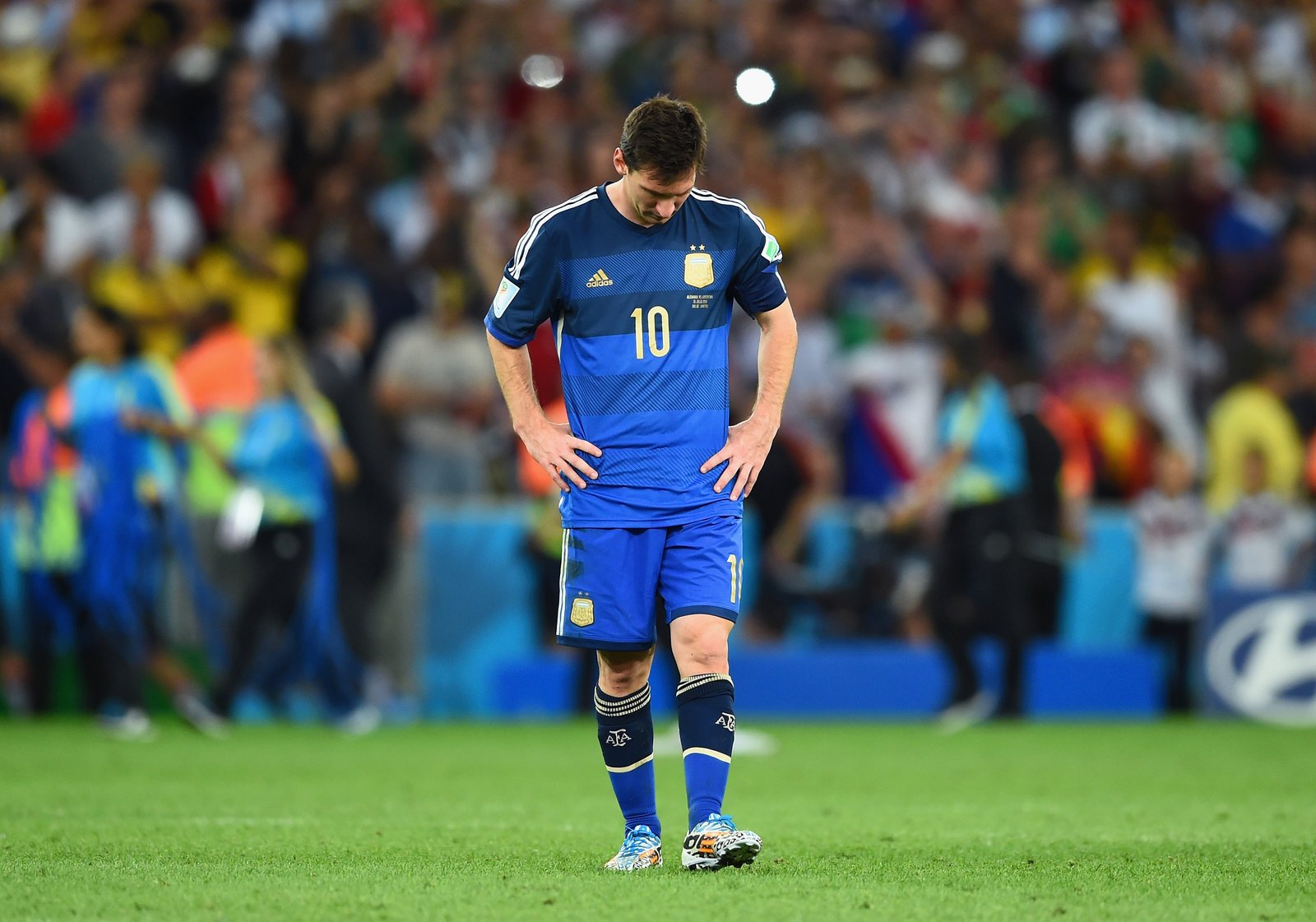 RIO DE JANEIRO, BRAZIL - JULY 13: A dejected Lionel Messi of Argentina reacts after being defeated by Germany 1-0 in extra time during the 2014 FIFA World Cup Brazil Final match between Germany and Argentina at Maracana on July 13, 2014 in Rio de Janeiro, Brazil. (Photo by Matthias Hangst/Getty Images)